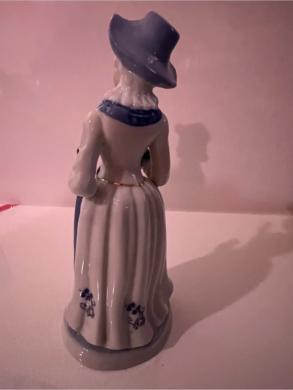 Vintage Porcelain Lady Figurine in White and Light Blue with Gold Accents